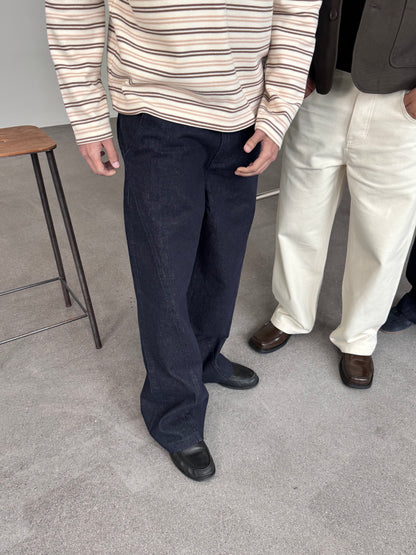 TWISTED RAW DENIM JEANS